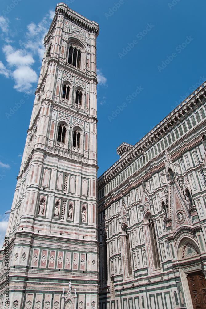 Famous Florence Duomo tower with white and green marble facade