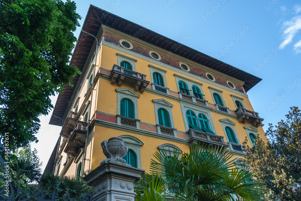 Fototapeta premium Beautiful Tuscan villa with mediterranean style facade and green window blinds