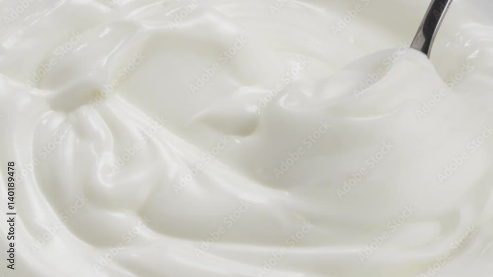 Slow motion of spoon taken from yogurt, 180fps prores footage Slow motion of spoon taken from yogurt, 180fps prores footage