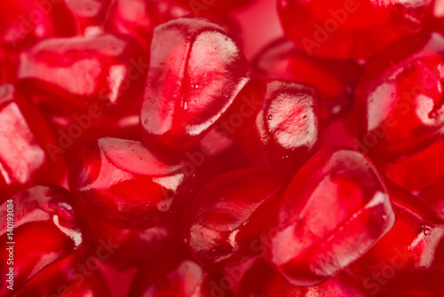 Background of ripe grains pomegranate