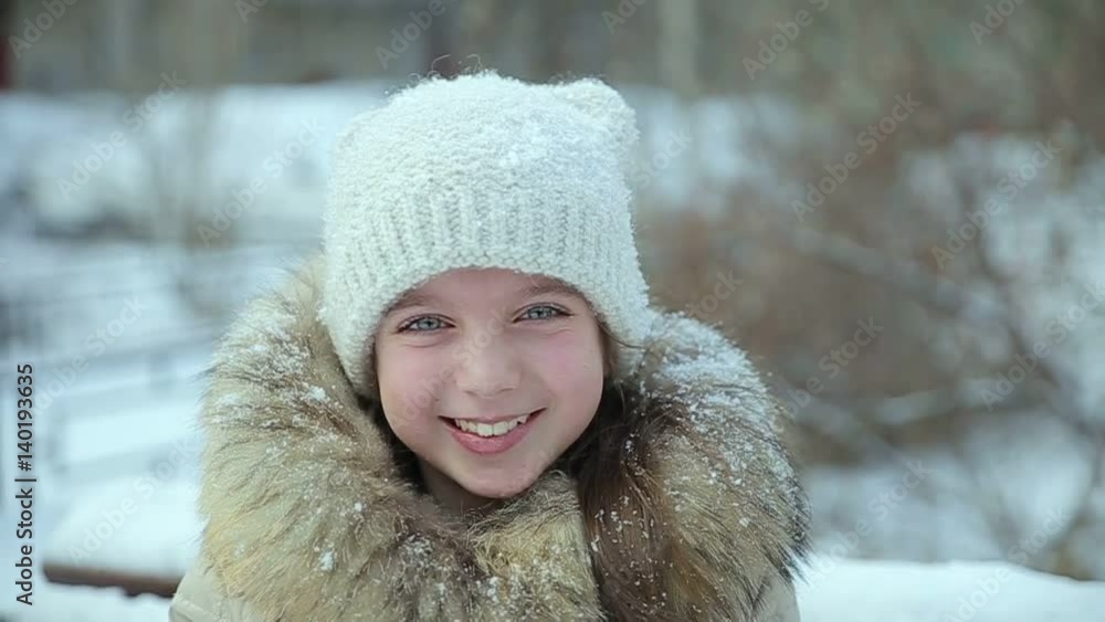 Small girl snowfall slow motion Small girl snowfall slow motion