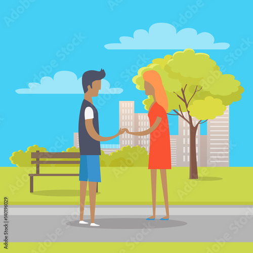 Young Boy and Girl in Love Stand on Park Path