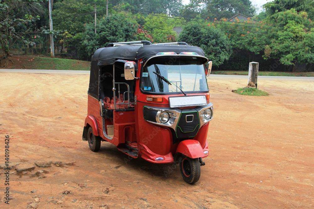 Traditional motorized rickshaw on the street