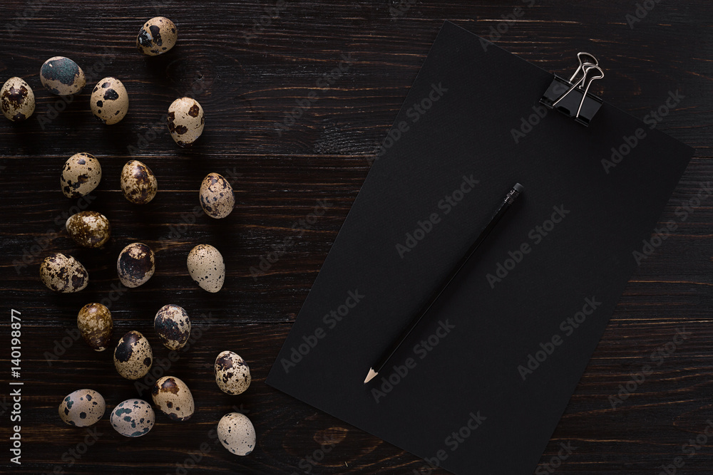 quail eggs, place for text on wooden rustic background top view close up quail eggs, place for text on wooden rustic background top view close up