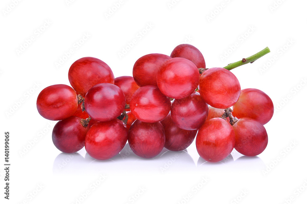 fresh red grapes with water drops isolated on white background.
