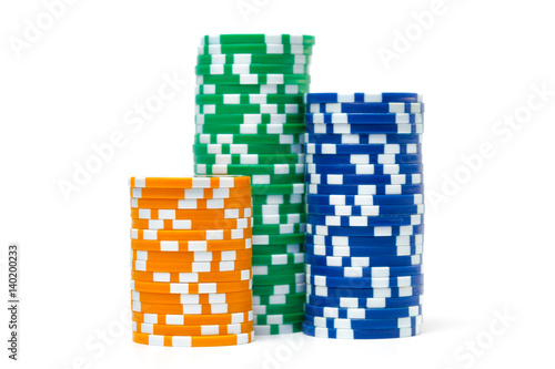 Stacks of poker chips isolated on white background