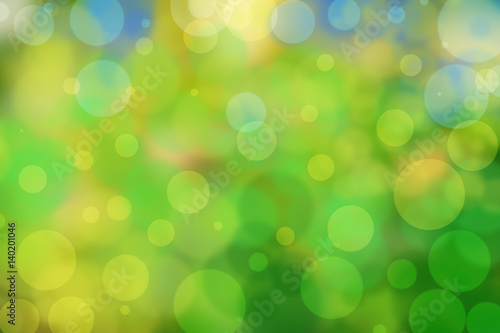 Green bokeh background with circles. Summer abstract theme.