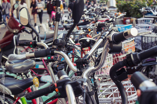 Public and private bicycles at bicycle parking spot; city of Shenzhen, People's republic of China