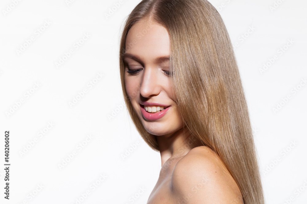 Cute young blonde model woman with long shiny hair white background Cute young blonde model woman with long shiny hair white background