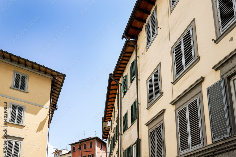 Beautiful street view of ancient buildings at old town near the Cathedral of Florence, Italy