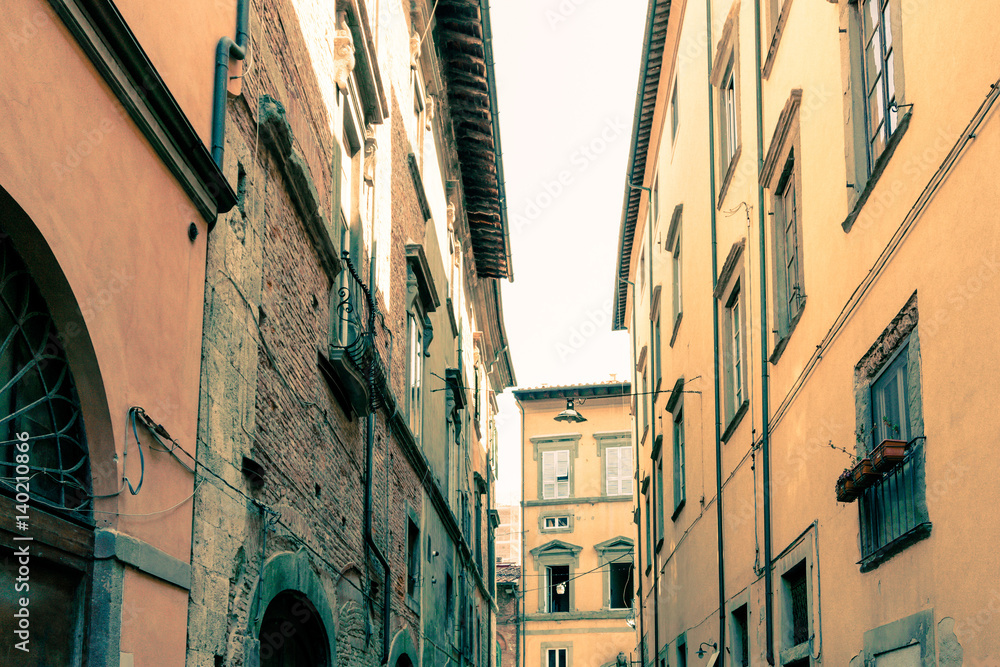 Beautiful street view of ancient buildings at old town near the Cathedral of Florence, Italy