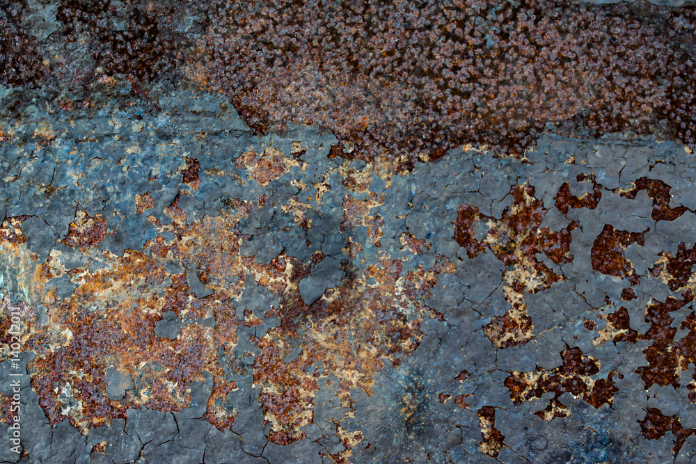 Texture of old rusty metal with remnants of paint Texture of old rusty metal with remnants of paint