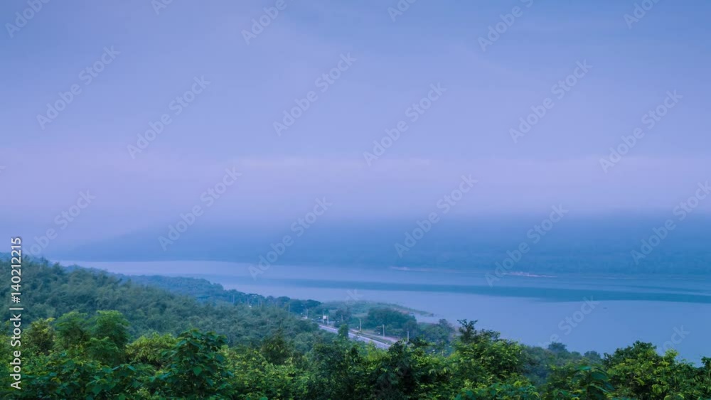 Awesome dynamic time lapse of fog drifting over the mountain lake at Lam Ta Khong Reservoir, Nakhon Ratchasima province, Thailand. Awesome dynamic time lapse of fog drifting over the mountain lake at Lam Ta Khong Reservoir, Nakhon Ratchasima province, Thailand.
