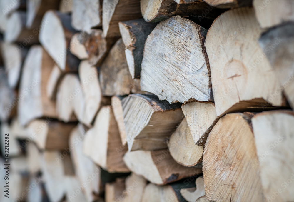 Firewood logs stacked in pile Firewood logs stacked in pile