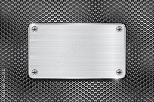 Metal brushed plate on iron perforated background