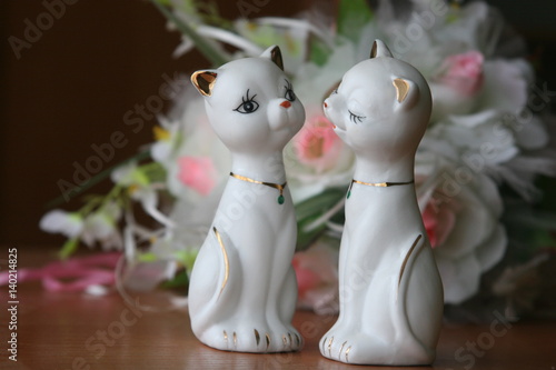 Kittens on a background of white flowers