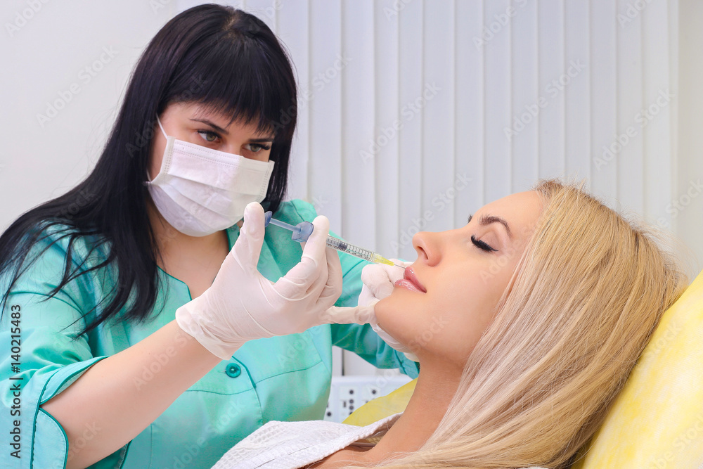 Injection in her lips and face. Injection in her lips and face.