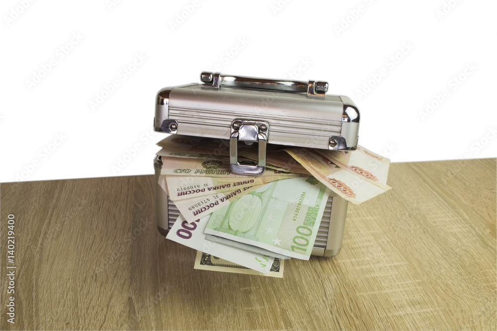 Banknotes in a trunk isolate on a white background Banknotes in a trunk isolate on a white background
