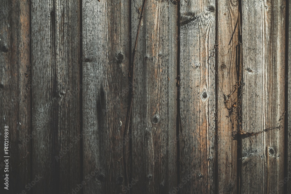 Wall of old and weathered wood. Wood texture with natural pattern.