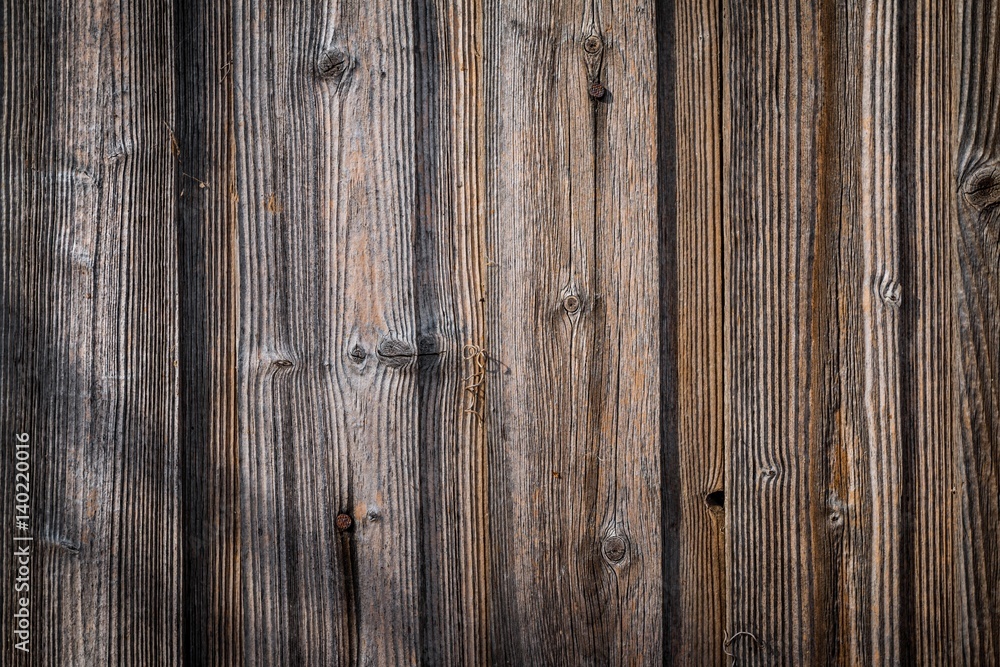 Wall of old and weathered wood. Wood texture with natural pattern. Wall of old and weathered wood. Wood texture with natural pattern.