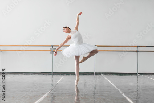 Female ballet dancer keep the rack in class