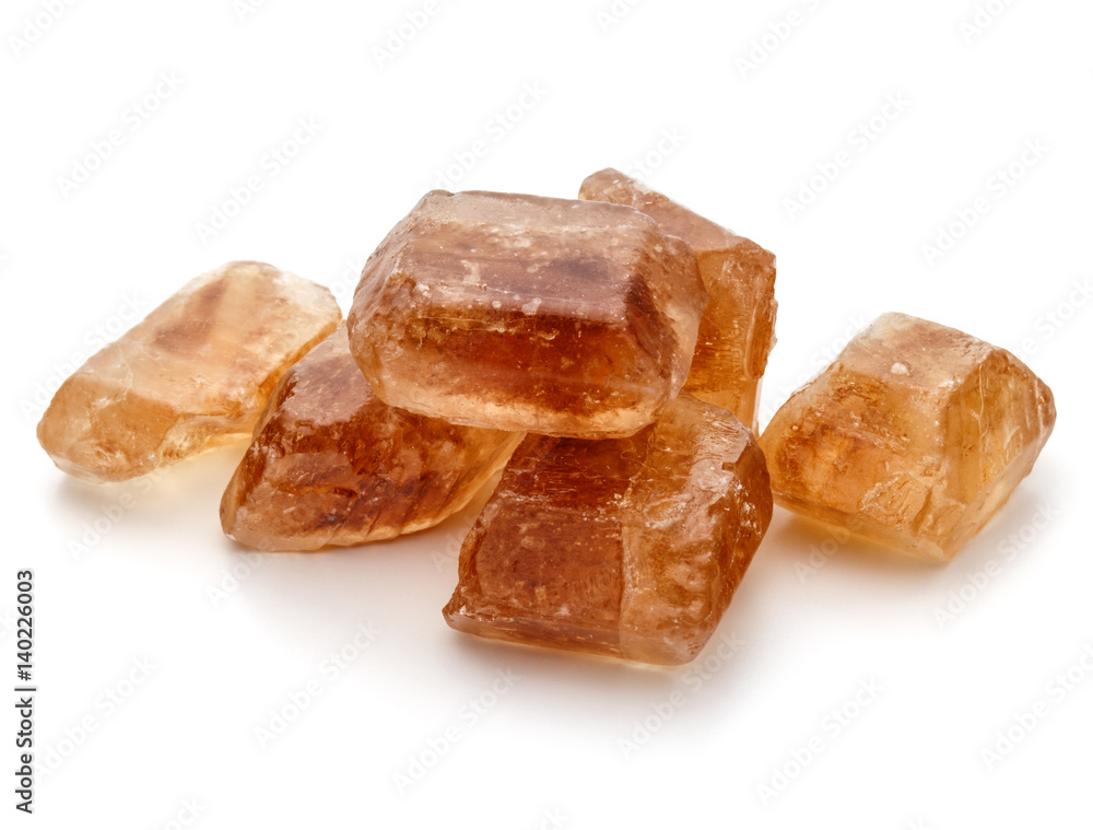 Brown caramelized lump cane sugar cube isolated on white background cutout Brown caramelized lump cane sugar cube isolated on white background cutout