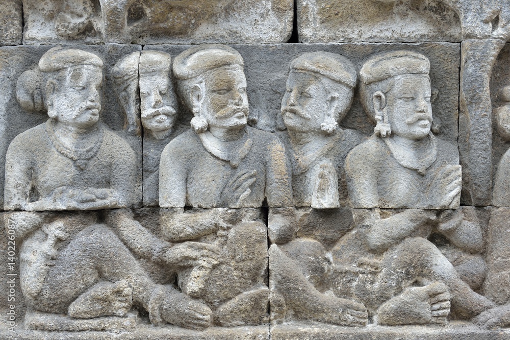 Detail of Buddhist carved relief in Borobudur temple in Yogyakarta, Java, Indonesia.. Detail of Buddhist carved relief in Borobudur temple in Yogyakarta, Java, Indonesia..