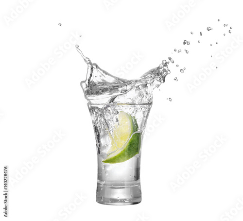 Photo shot of vodka or tequila with lime slice