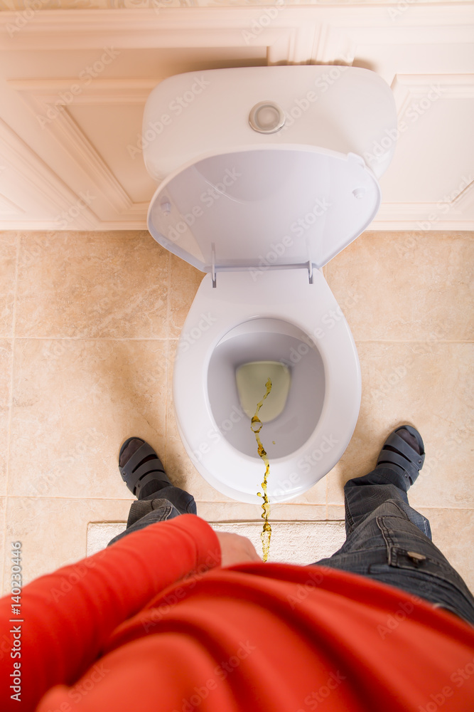 Man pissing in the toilet, top view Stock Photo | Adobe Stock