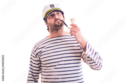 Young sailor with smoking pipe