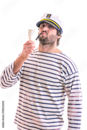 Young sailor with smoking pipe