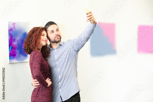 Young couple in modern art ...