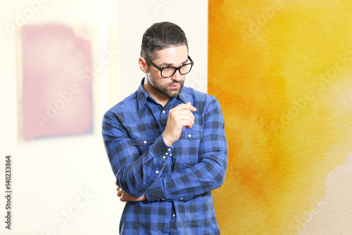 Young man in modern art gal...