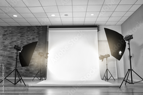 Empty photo studio with lig...