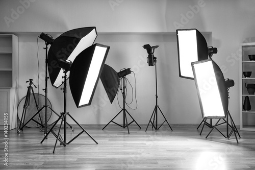 Empty photo studio with lig...