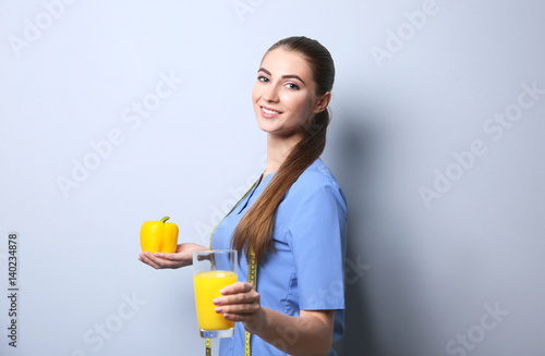 Young female nutritionist o...
