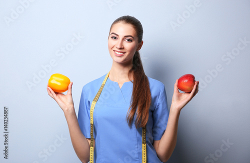 Young female nutritionist o...