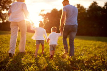 Blurred background of family in nature