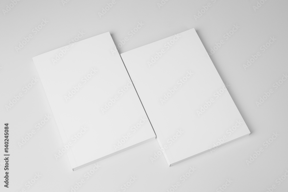 Real paperback white books on a gray background Real paperback white books on a gray background