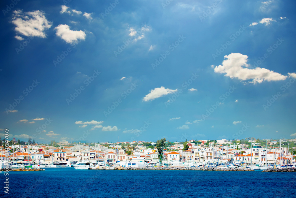 EGINA, GREECE - JUNE 08, 2016: a beautiful view of the wonderful port city on the sky background in Greece