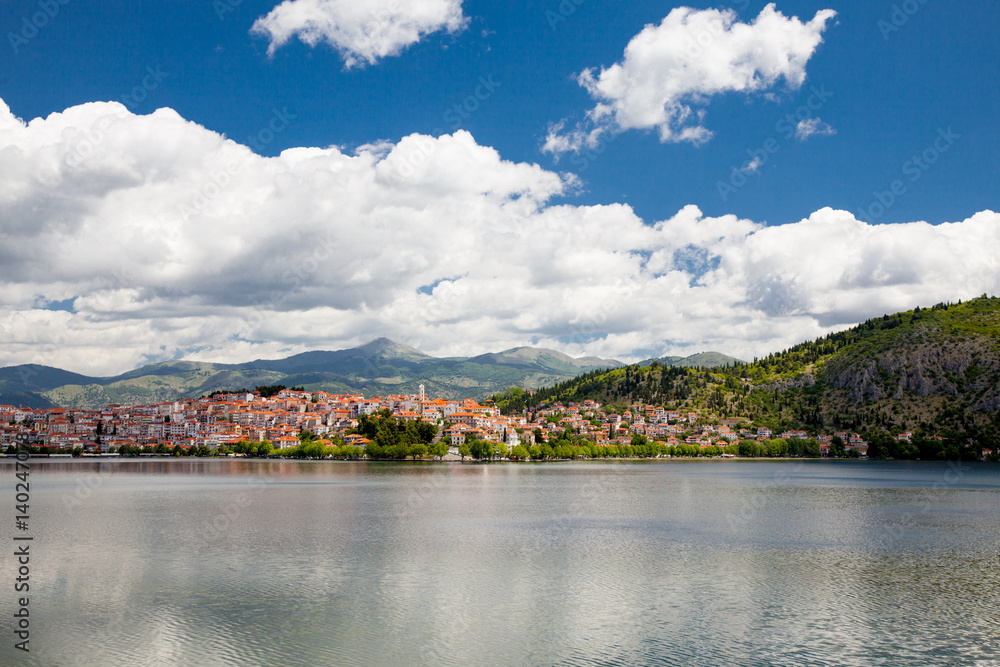 KASTORIA, GREECE - JUNE 02, 2016: a beautiful view of modern town on the wonderful mountains background in Greece