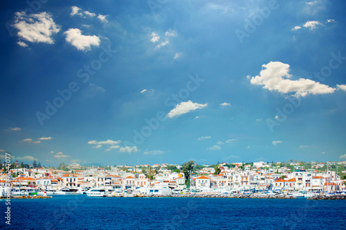 EGINA, GREECE - JUNE 08, 2016: a beautiful view of the wonderful port city on the sky background in Greece © Masson
