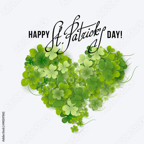 Saint Patricks Day Card with heart shaped Shamrock on Gray Background. Calligraphic Lettering Happy St Patricks Day. Vector Illustration.