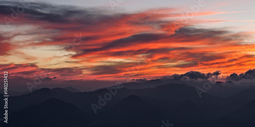 Red clouds in the sky at sunset © luigimorbidelli