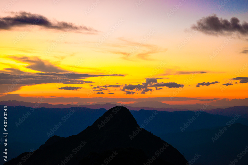 Natural sunset on the peak of mountain