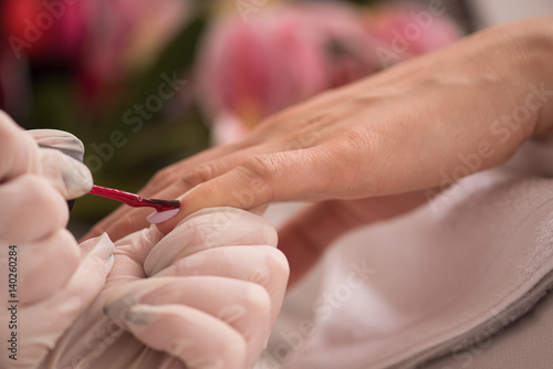 Woman hands receiving a manicure