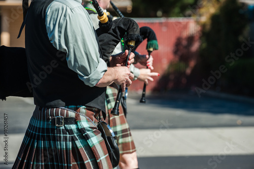 Fotografie Irish bagpipe players waking along the parade route.