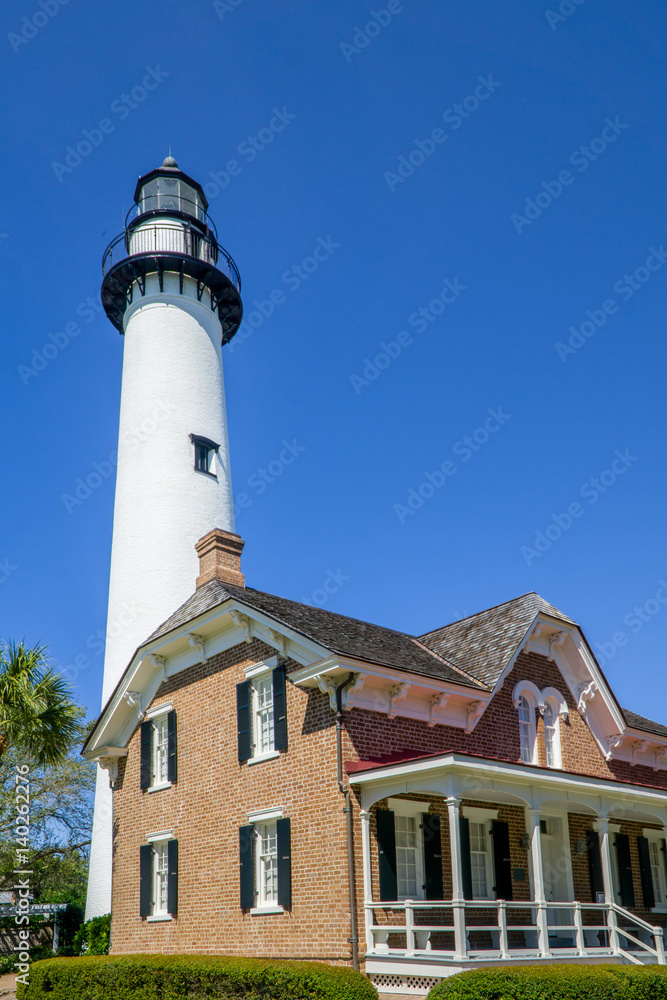 A lighthouse stands guard along the coast