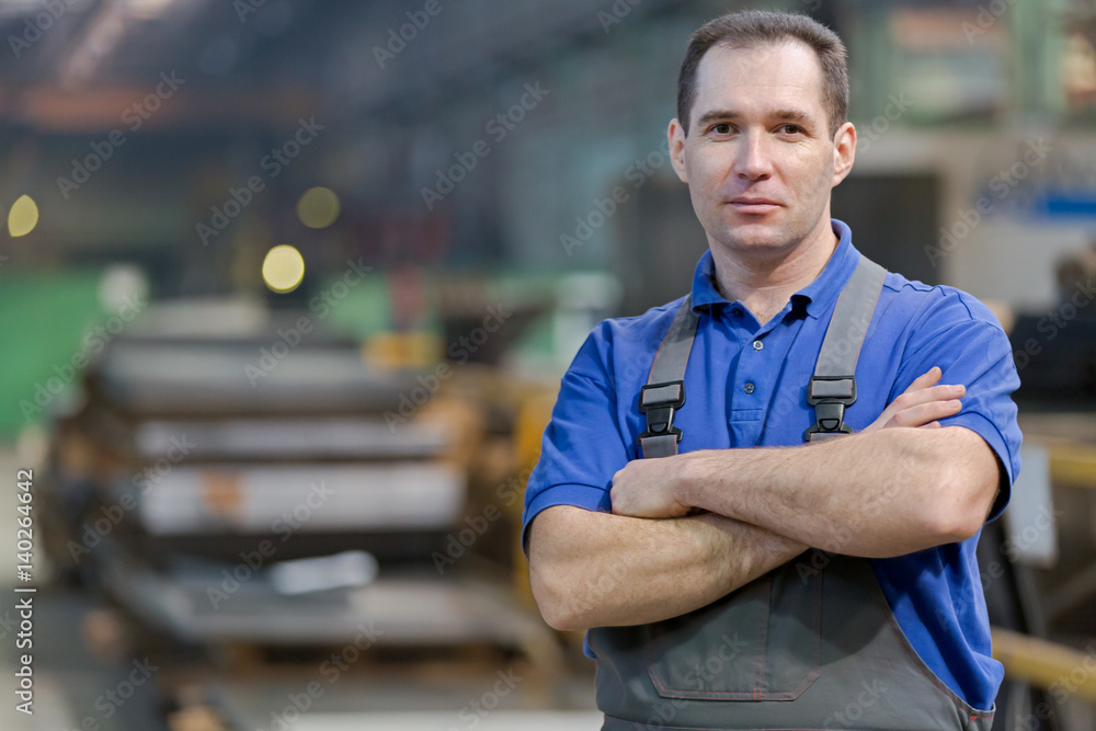 Service man worker at factory workshop background Service man worker at factory workshop background