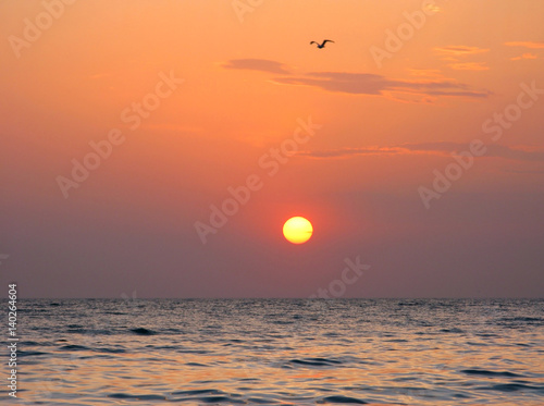 Fototapeta Naklejka Na Ścianę i Meble -  Fantastic orange sea ocean sunset horizon sky photo